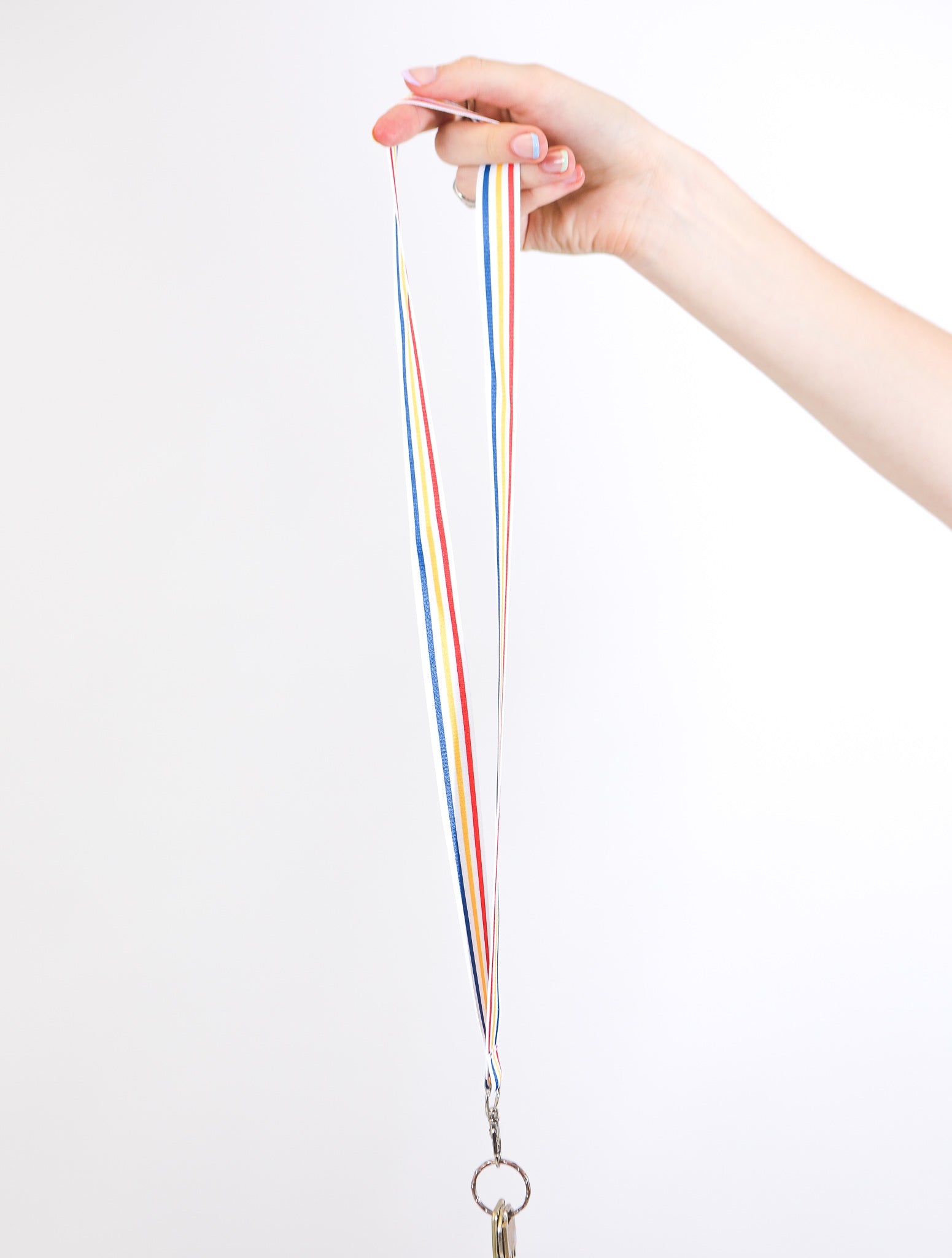 minimalist red, white, yellow and blue striped lanyard 